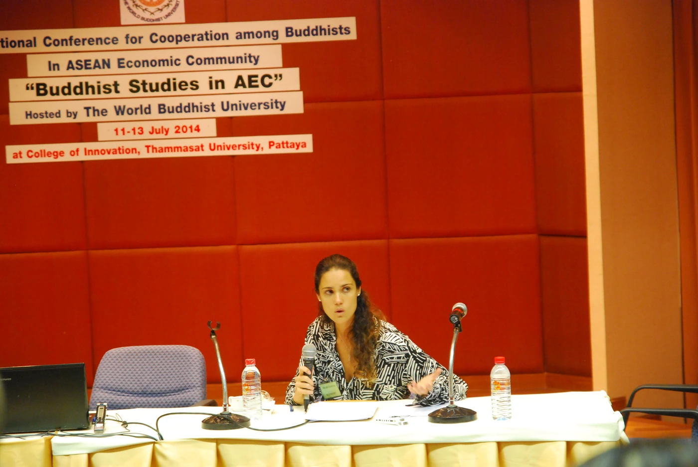 Juliana speaking at a conference